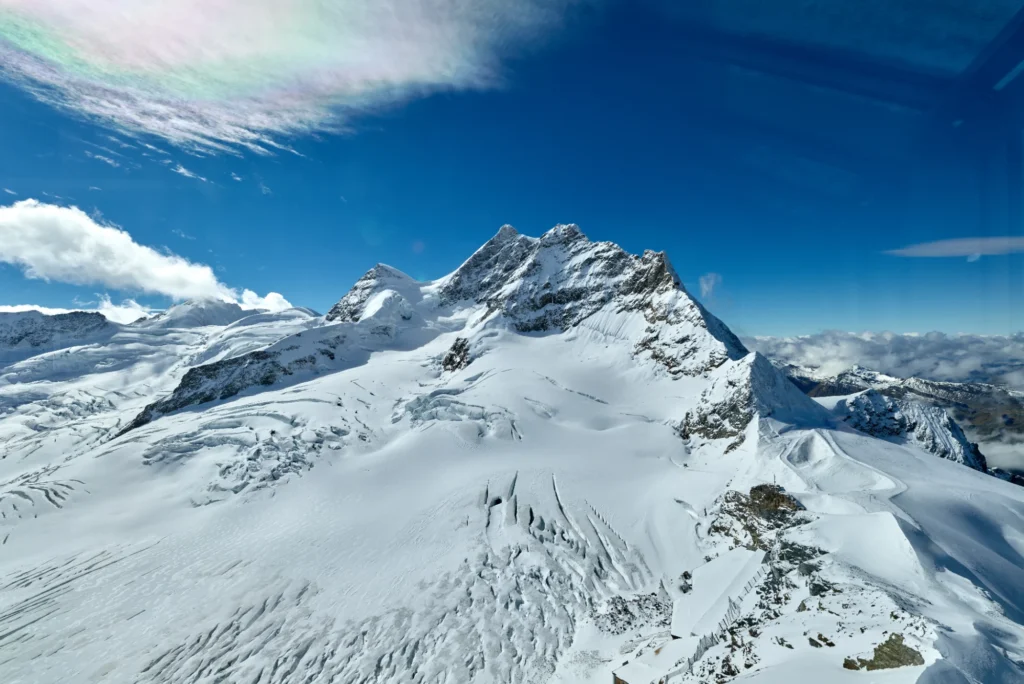 The snow-covered summit of the Jungfrau seen from the Sphinx terrace on the Jungfraujoch