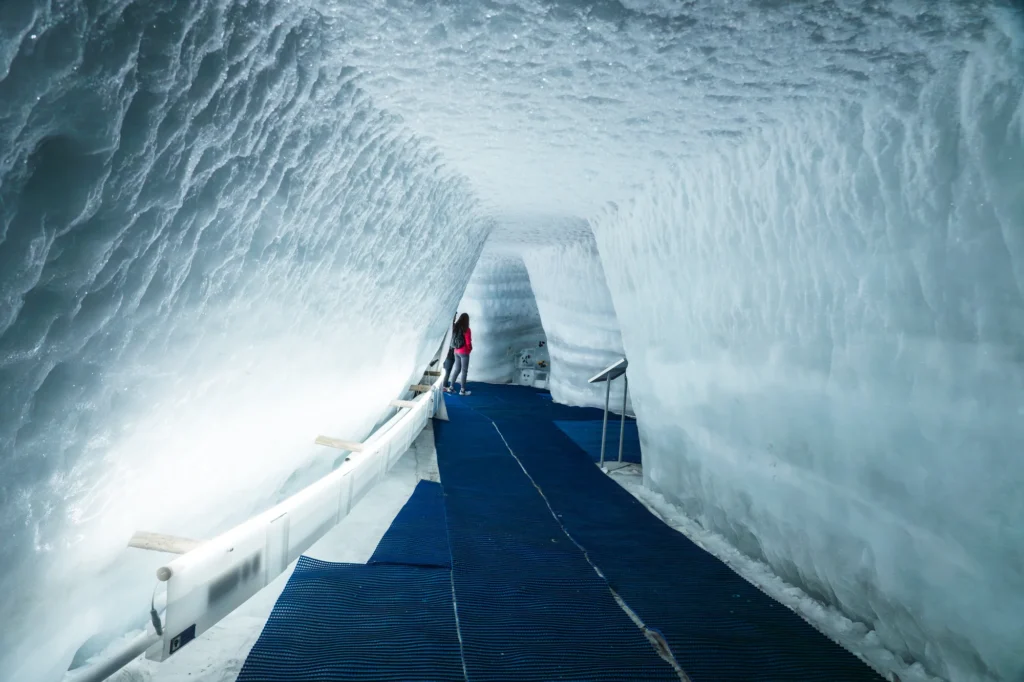Blue ice tunnel inside the glacier palace at Matterhorn Glacier Paradise